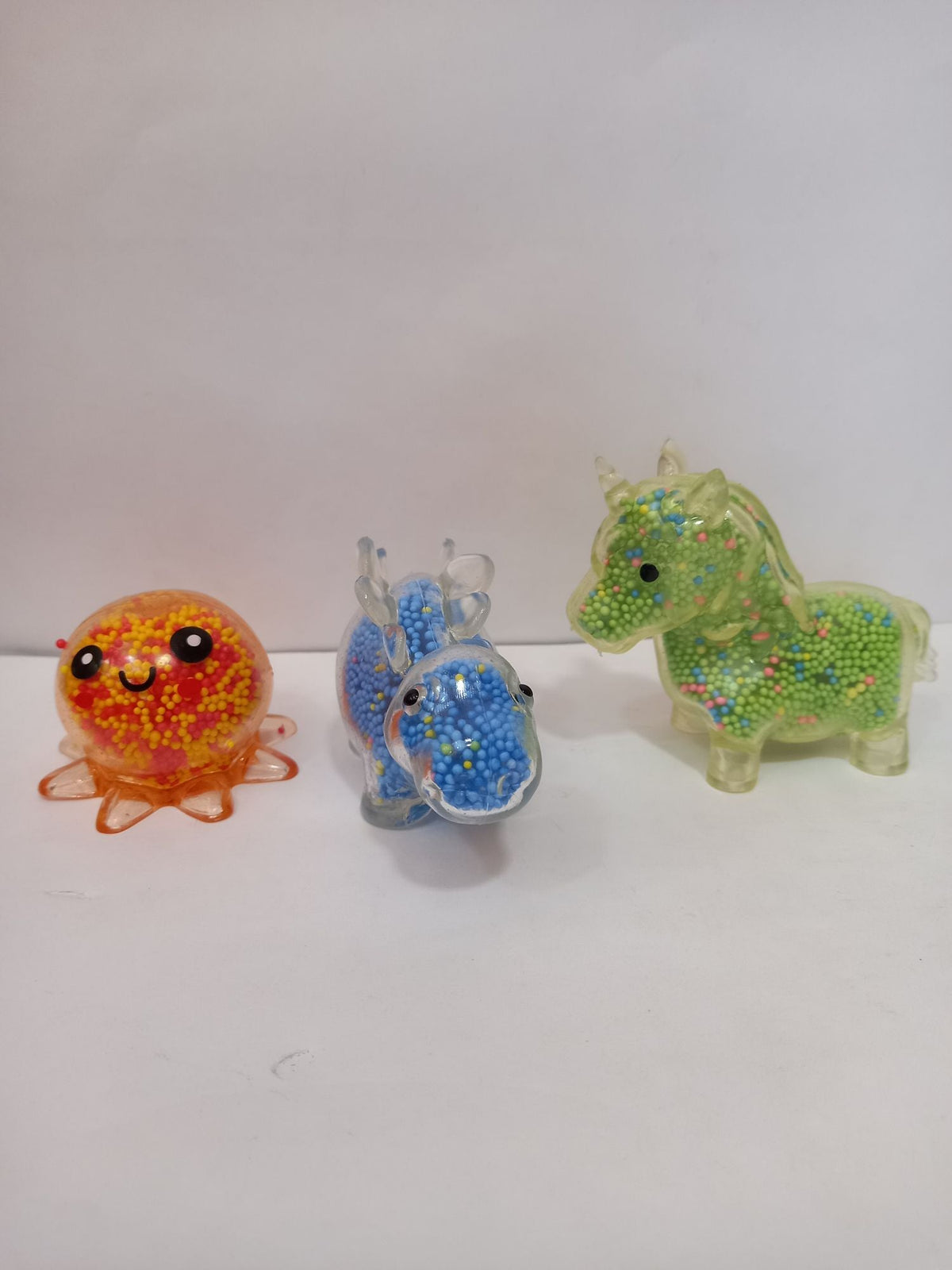 SQUISHIES CON LUZ-DINO,UNICORNIO,PULPO